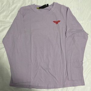 Women’s wonder women long sleeve, size medium. Worn twice